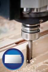 kansas map icon and a CNC milling machine cutting wood