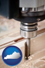 kentucky map icon and a CNC milling machine cutting wood