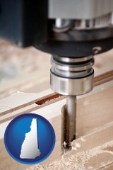 new-hampshire map icon and a CNC milling machine cutting wood