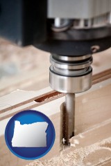 oregon map icon and a CNC milling machine cutting wood