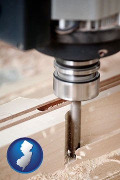 a CNC milling machine cutting wood - with New Jersey icon